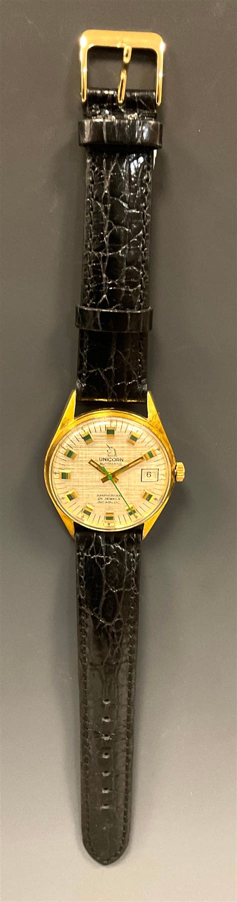 leather band square face by rolex unicorn vintage watch